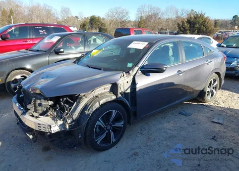 2017 Honda Civic Touring z USA, uszkodzony, nr VIN 19XFC1F91HE019219